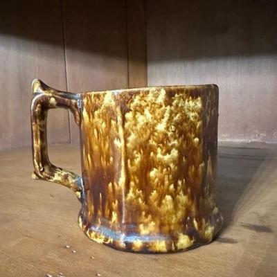 A Collection of Ohio Trinkets, Marbles, Rockingham Glaze Mug and Other Items