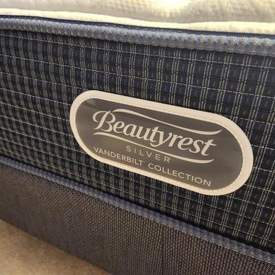 Lot #124 Super Nice Queen Beauty Rest Mattress and Box Spring Set with metal bed frame.