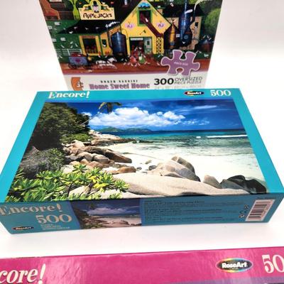 Lot #132L Lot of 3 factory sealed Jigsaw puzzles