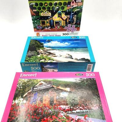 Lot #132L Lot of 3 factory sealed Jigsaw puzzles
