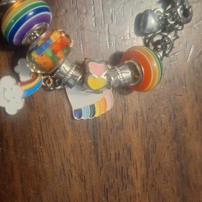 Girls charm bracelet with extra charms