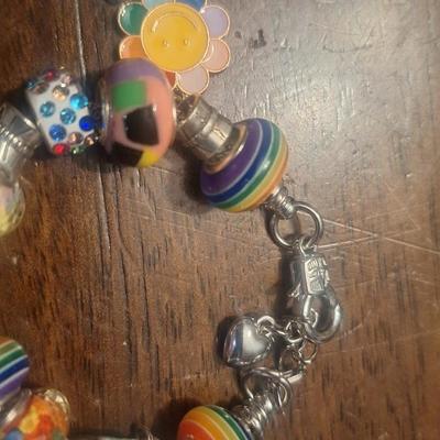 Girls charm bracelet with extra charms
