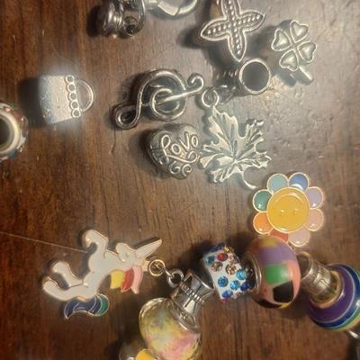 Girls charm bracelet with extra charms