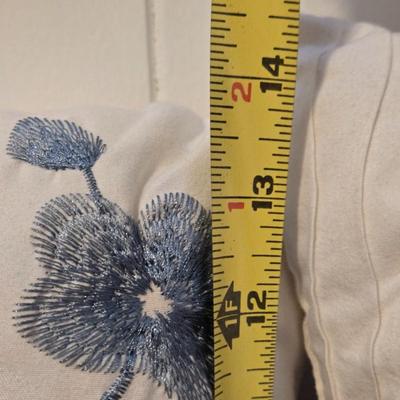 White Ridged Decorative Pillow & White and Blue Flower Decorative Pillow