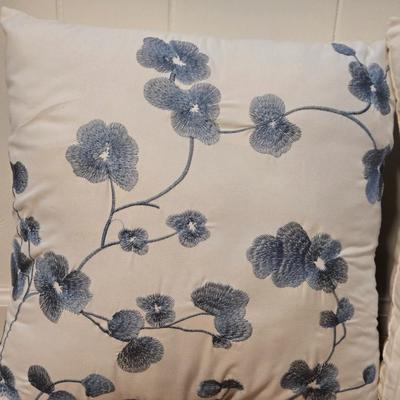 White Ridged Decorative Pillow & White and Blue Flower Decorative Pillow