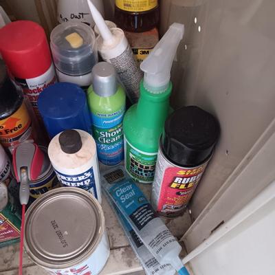 MOSTLY HOUSEHOLD CHEMICALS AND CANS OF SPRAY PAINT