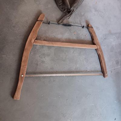 LEATHER HORSE COLLAR & AN ANTIQUE BUCK SAW