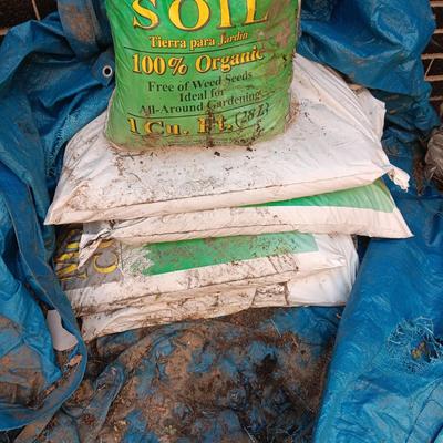 5 SEALED BAGS OF MOUNTAIN COUNTRY TOP SOIL