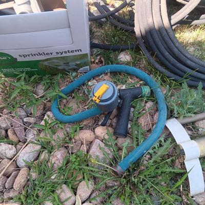 SYSTEM HOSE, SPRINKLERS AND WEED SPRAYER