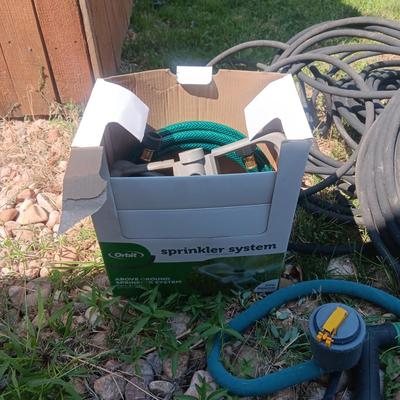 SYSTEM HOSE, SPRINKLERS AND WEED SPRAYER
