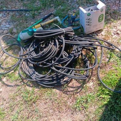 SYSTEM HOSE, SPRINKLERS AND WEED SPRAYER