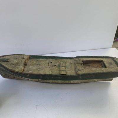 Antique carved Shipwrecked boat and fisherman figure with framed boat artwork