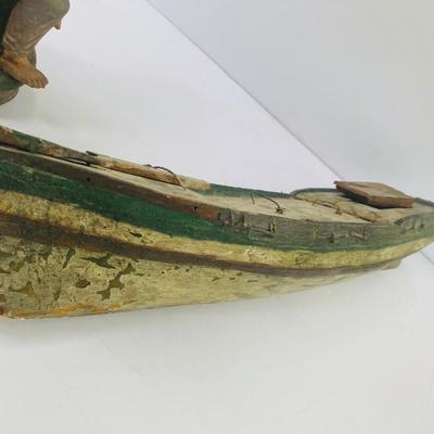 Antique carved Shipwrecked boat and fisherman figure with framed boat artwork
