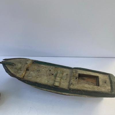 Antique carved Shipwrecked boat and fisherman figure with framed boat artwork