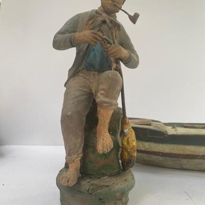 Antique carved Shipwrecked boat and fisherman figure with framed boat artwork