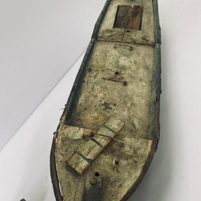 Antique carved Shipwrecked boat and fisherman figure with framed boat artwork