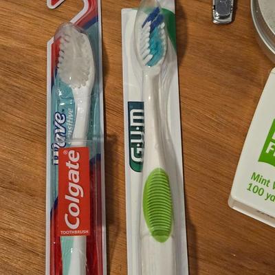 Mixed Beauty Lot - Lotions Chapstick, Sunblock, Toothbrushes, and Floss,