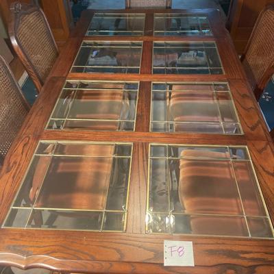 F8-Glass top table with six chairs