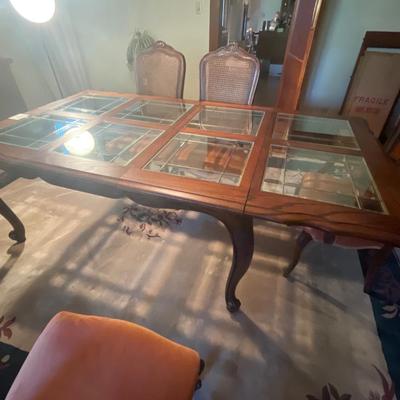 F8-Glass top table with six chairs