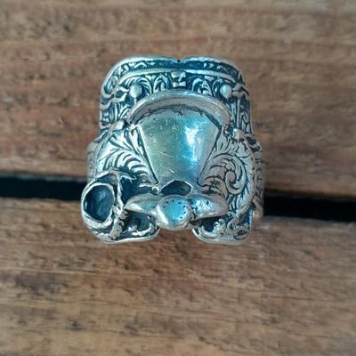 An astonishing Navajo Sterling silver saddle ring.