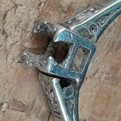 18K white gold scrap = 18k marked