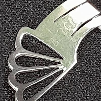 18K white gold scrap = 18k marked