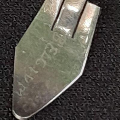 18K white gold scrap = 18k marked