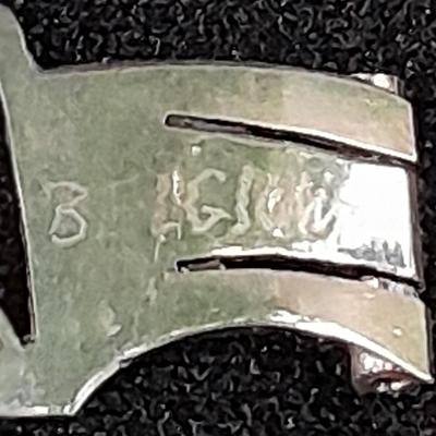 18K white gold scrap = 18k marked