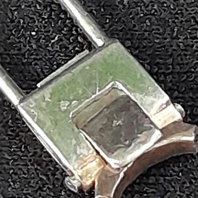 18K white gold scrap = 18k marked