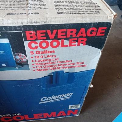 LIKE NEW COLEMAN BEVERAGE COOLER AND A 5 GALLON WATER CONTAINER