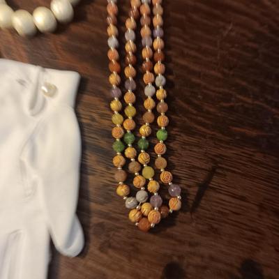 BEADED NECKLACES AND DRESS GLOVES