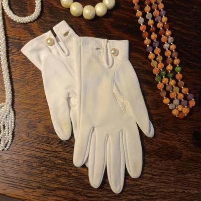 BEADED NECKLACES AND DRESS GLOVES
