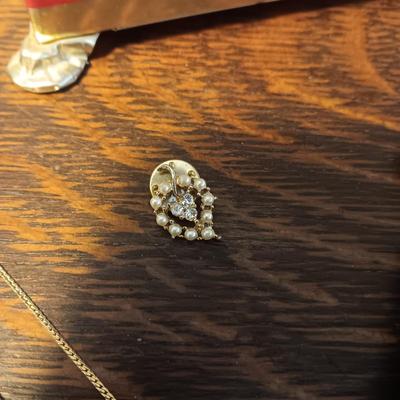 TIN CHEST, SCARF WITH PINS, GOLD TONE CHAIN AND FAUX PEARL LEAF PIN