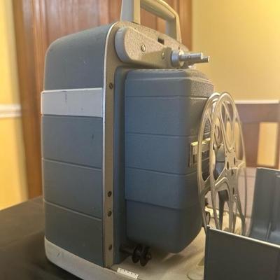 Bell & Howell Autoload Movie Projector and Radiant Colormaster Projector Screen