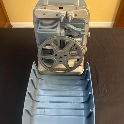 Bell & Howell Autoload Movie Projector and Radiant Colormaster Projector Screen