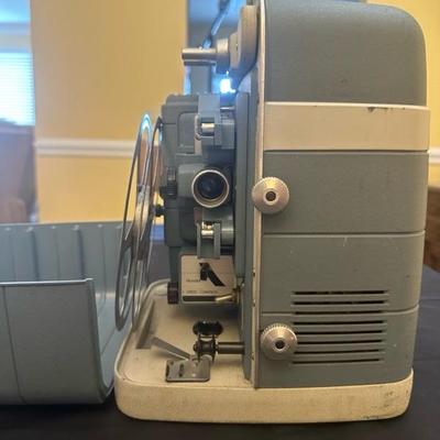 Bell & Howell Autoload Movie Projector and Radiant Colormaster Projector Screen
