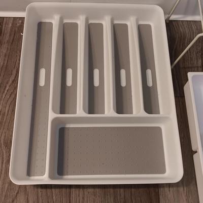 Kitchen Drawer and Pantry organizers with two dish towels and a dishrack