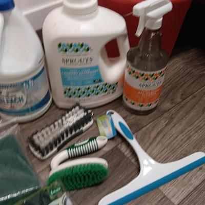 Cleaning products and cleaning tools with a mop bucket and new rubber gloves