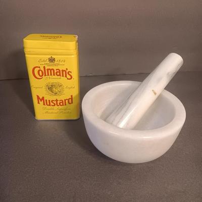 Mortar and Pestle white Marble with an empty Colman's mustard tin