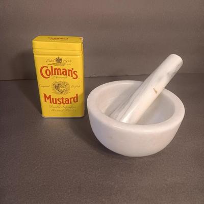 Mortar and Pestle white Marble with an empty Colman's mustard tin