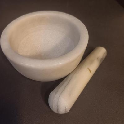 Mortar and Pestle white Marble with an empty Colman's mustard tin