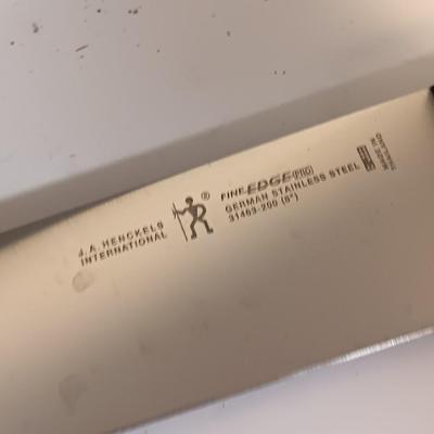 Set of J.A. Henckels International fine edge knives with vintage knife block