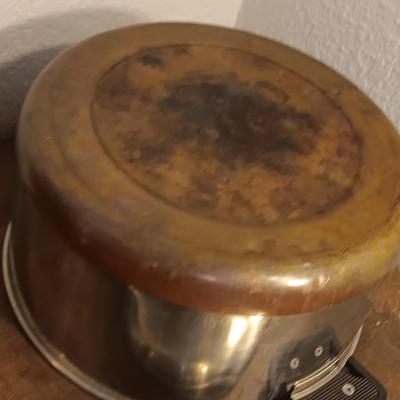 Stainless steel pots and pans with a stainless steel steamer