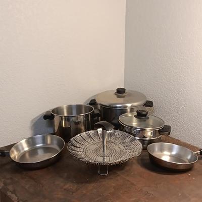 Stainless steel pots and pans with a stainless steel steamer