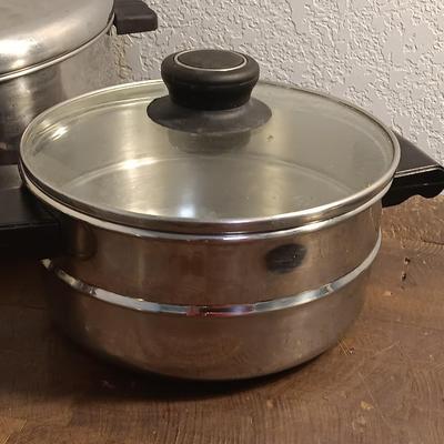 Stainless steel pots and pans with a stainless steel steamer