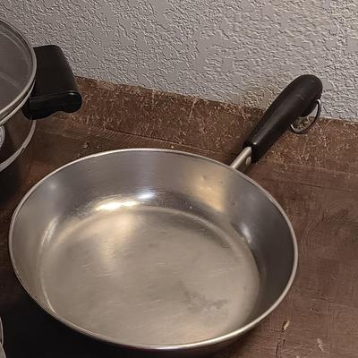 Stainless steel pots and pans with a stainless steel steamer