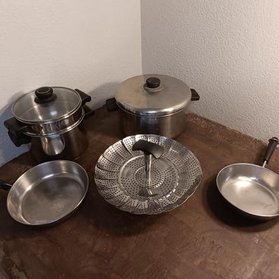 Stainless steel pots and pans with a stainless steel steamer