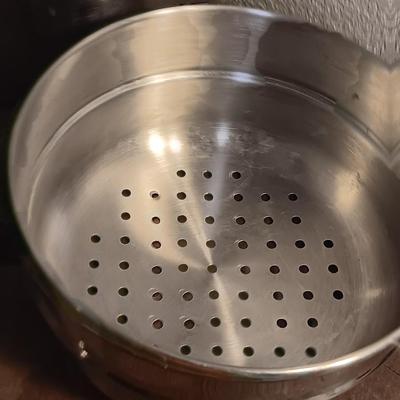 Stainless steel pots and pans with a stainless steel steamer