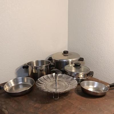 Stainless steel pots and pans with a stainless steel steamer