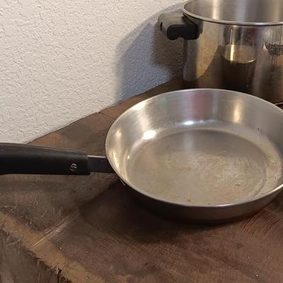 Stainless steel pots and pans with a stainless steel steamer